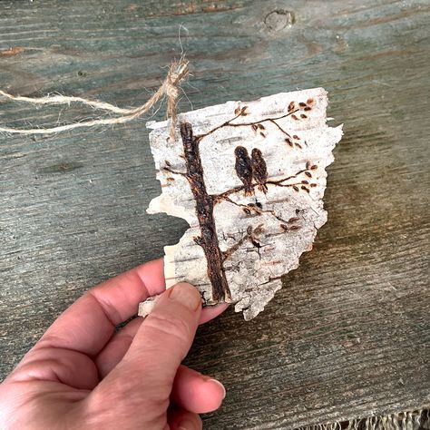 This is a handmade accent or gift tag made with real birch bark. They feature birds sitting on branches. You can use these rustic tags in numerous ways to add unique accents to your home decorating. You may want to wrap all your gifts with a natural birch bark tag! They are really fun to use with vintage books or to tie around the vase on your table centerpiece. Many people enjoy using these tags as a whimsical bookmark! -To make these tags I collect birch bark from the woods I live near.  -I ha Birch Bark Christmas Ornaments, Birch Bark Crafts Diy, Birch Bark Art, Birch Decorations, Birch Bark Decor, Tree Bark Crafts, Bark Idea, Tree Branch Crafts, Rustic Gift Wrapping