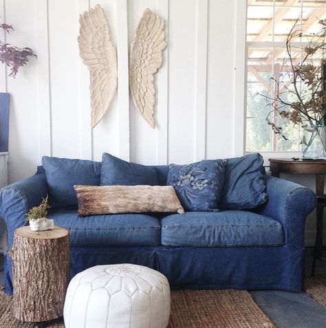 From the Nesting Place instagram a little shot of our 10 year old denim slipcovered sofa with the stump table on casters we made from a fallen tree, pouf and the signature piece in this photo is th... Denim Couch, Denim Sofa, Denim Furniture, Blue Couch, Blue Couches, Throw Pillows Living Room, Denim Decor, New Living Room, Slipcovered Sofa