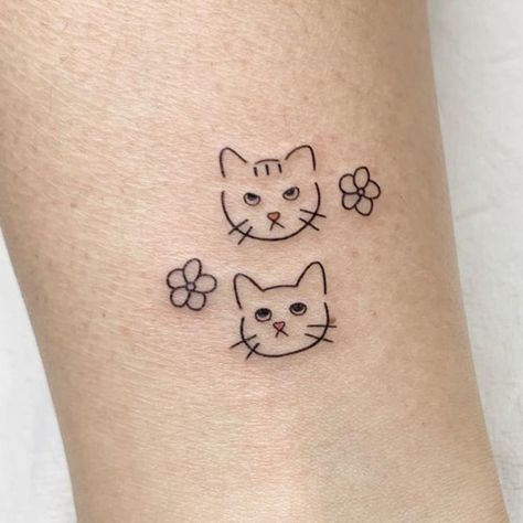 Top Minimal And Small Cat Tattoos You'll Want To See | Inku Paw Mean Cat Tattoo, Minimalist Two Cat Tattoo Designs, Cat Mom Tattoo Small, Tiny Matching Cat Tattoos, Cat Paws Tattoo Ideas, Cat Tattoo Small Simple Outline, Two Cats Tattoo Ideas, Three Cats Tattoo Simple, 2 Cats Together Tattoo