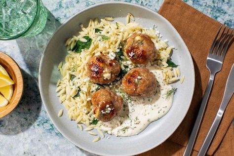 Turkey Feta Meatballs and Lemon Crema with garlicky spinach orzo Turkey Feta Meatballs, Sausage Lasagna Soup, Feta Meatballs, Costco Appetizers, Spinach Orzo, Meal Kits, Dinner Entrees, Meal Delivery Service, Meal Kit