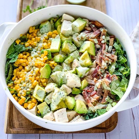 Green Goddess Cobb Salad by The Feathered Nester: Classics are great, but if you are ready for a truly spectacular salad then you’ve got to try this dairy-free and gluten-free Green Goddess Cobb Salad! Loaded with mixed greens, corn, avocado, and bacon this salad recipe will definitely become your new go-to summer salad! Copycat Panera Salad, Green Goddess Cobb Salad, Panera Green Goddess Salad, Panera Salad, Cobb Salad Ingredients, Goddess Dressing Recipe, Green Goddess Salad, Goddess Salad, Cobb Salad Recipe