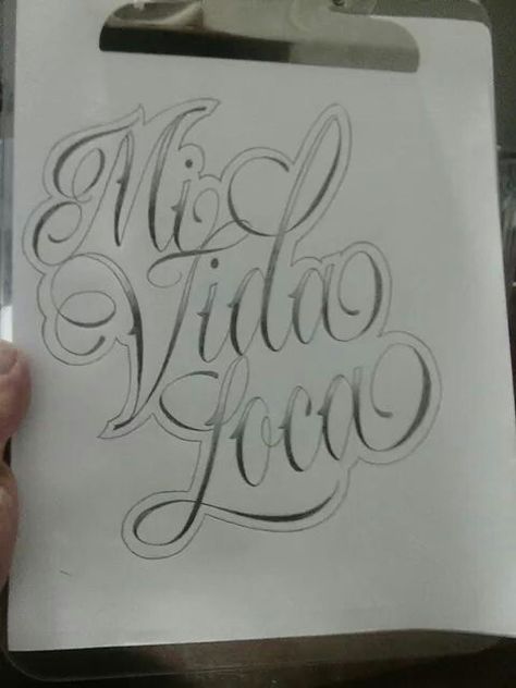 Mi vida loca Livin La Vida Loca Tattoo, Mi Vida Loca Tattoo, Self Made Tattoo Lettering, La Tattoo Lettering, Loca Tattoo, Chicano Tattoo Font, Cursive Tattoo Letters, Hernandez Tattoo Lettering, Dream Catcher Drawing