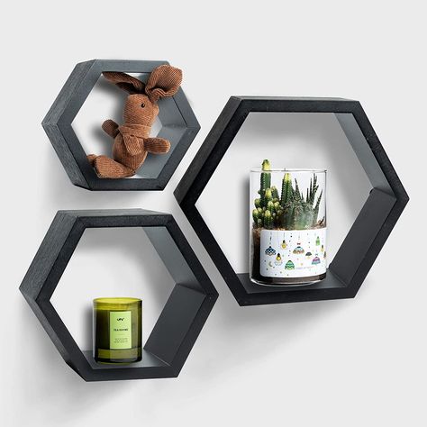 Three floating shelves for wall in different sizes provide sufficient room for displaying ornaments and organizing small items, keeping your space neat and tidy, The unique feature of this set of honeycomb shelves is that Designed to support heavier objects compared to similar products, providing you with peace of mind and versatile storage options. Convenient iron hanging holes on the back hexagon floating shelves allow for hassle-free installation Octagon Shelves, Floating Shelves Modern, Hexagon Floating Shelves, Shelves Modern, Wood Hexagon, Honeycomb Shelves, Cheap Wall Decor, Hexagon Shelves, Black And White Photo Wall