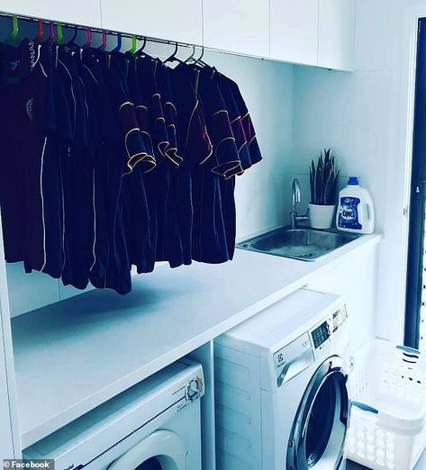 A big time saver! 'Concealed hanging rail in my laundry for school uniforms. Saves having ... Laundry Basket Pass Through, Laundry Room Hidden Hanging Rack, Hidden Hanging Rail Laundry, Hanging Rail Laundry, Pull Out Hanging Rail, Glow Mirror, Concealed Laundry, Shed Home, Loft Beds