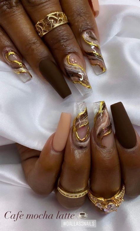 There's a new beauty trend taking over Instagram and it's absolutely stunning. Say hello to "quartz nails". Brown And Grey Nails Design, Pretty Nail Ideas Acrylic Fall, Army Green And Brown Nails, Brown And Gold Marble Nails, Cream And Gold Nail Designs, Brown Fall Nails 2022, Chocolate And Gold Nails, Coffin Acrylic Nails Gold, Bronze Nail Art