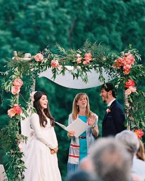 Carrie And Dan's Musical Nashville Wedding - The Ceremony  Carrie and Dan made it official beneath a huppa of peonies, garden roses, bay leaves, Italian ruscus, and ranunculus, which was built by two of the couple’s friends. The mutual pal who introduced the pair in 2008? She served as ring bearer.   Given that the groom is a record producer and the bride is the granddaughter of Johnny Cash, it was no surprise that music was a focus for their Jewish celebration. Dan composed the processional tun Ceremony Timeline, Jewish Wedding Chuppah, Jewish Wedding Traditions, Wedding Chuppah, Jewish Celebrations, Italian Ruscus, Beach Wedding Flowers, Wedding Planning Timeline, Peonies Garden