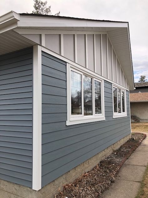 Indigo vinyl siding from Mitten Indigo Vinyl, Blue Vinyl Siding, Grey Vinyl Siding, Future Mansion, Blue Siding, James Hardie Siding, Hardie Siding, Window Trim Exterior, Bungalow Renovation