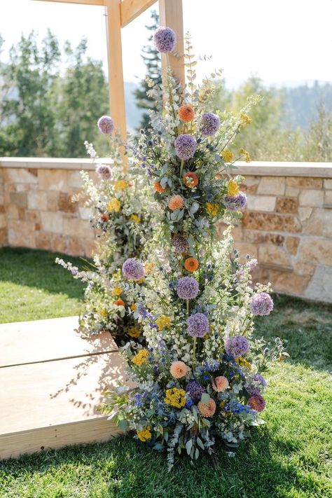 Purple And Orange Flowers Wedding, Tangled Wedding Flowers, Flower Poles Wedding, Allium Wedding Flowers, Lavender Chuppah, Green Purple Yellow Wedding, Blue Purple Yellow Wedding, Orange And Purple Wedding Flowers, Purple And Yellow Wedding Flowers