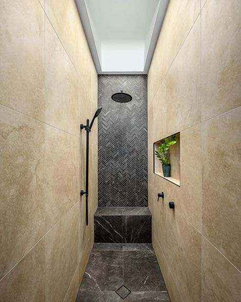 Narrow bathroom shower inspo with mixed tiles, overhead matte black showerhead and natural lighting.

Reece featured products 🛁: 
Mizu Drift Overhead Shower & Single Rail Shower

IG credit 📷: @itsa.homes Bathroom Niche, Narrow Bathroom, Small Bathroom With Shower, Bathroom Inspo, Bathroom Renos, Bathroom Shower, Shower Heads, Small Bathroom, Matte Black