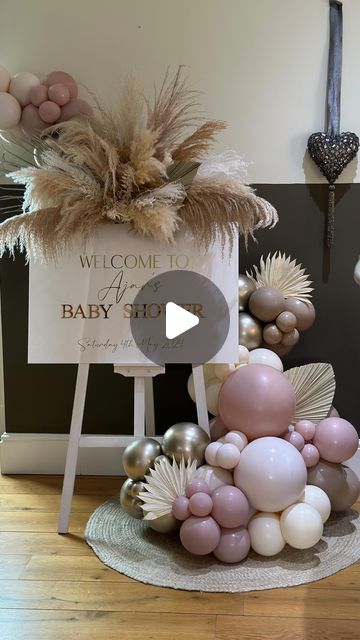 Marley & Nusha Events on Instagram: "Ajar’s baby shower   We went with a boho luxe feel for the displays.   From the ripple sailboard with glowing neon sign & fluffy pampas.   To the welcome sign with its luxurious 3D lettering and soft pink hues.   Did you spot my new gold floral plinths?  Perfect for mini pampas displays.   And soft satin orbz with chiffon ribbon were placed around the venue to create height.   .  .  .  #marleyandnusha #balloons #balloondisplay #balloonstylist #balloonstyling #organicballoons #ohbaby #neonsign #babyshower #boho #bohobabyshower #babyshowerballoons #babyballoons #eventdecor #sailboarddisplay #eventstyling #leeds #bradford #huddersfield #wakefield #westyorkshireballoons" Boho Balloon Columns, Boho Theme Baby Shower Ideas, Balloon And Pampas Centerpiece, Balloons And Pampas, Balloon Ring With Pampas, Balloon Garland With Pampas, Floral Plinths, Pink And Gold Baby Shower Ideas, Pink Boho Baby Shower Ideas