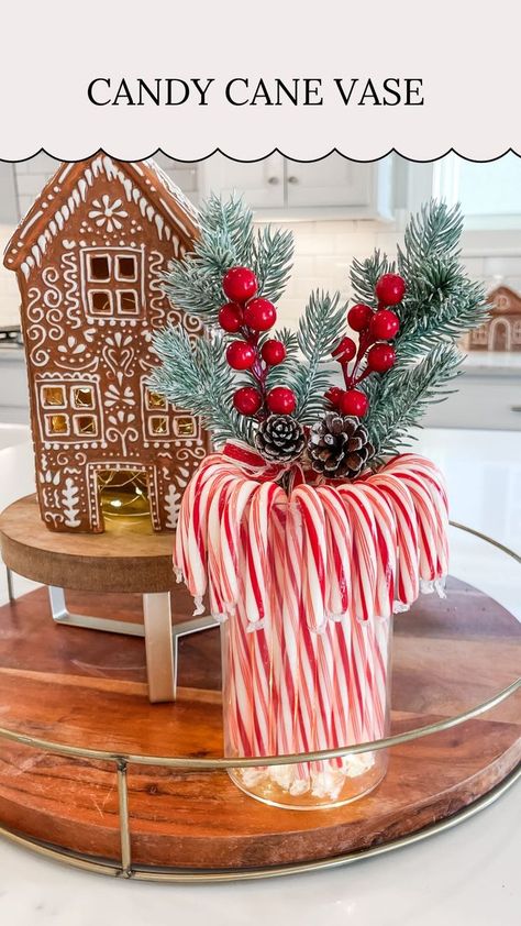 🎄Candy Cane Vase 🎄⁣⁣⁣ ⁣⁣⁣ Save this for a super easy + budget friendly Christmas DIY! Here’s a little sneak peak of the Christmas fun I have planned for the upcoming season!⁣ ⁣ I added fairy lights to a small vase, looped candy canes over it & added some Christmas stems! Such an easy Christmas craft that would make a beautiful centerpiece!⁣⁣⁣ .⁣⁣⁣ .⁣⁣⁣ .⁣⁣⁣ .⁣⁣⁣ #christmas #christmasdiy #christmascraft #christmasdecor #christmasdecorations #christmasdecorating #christmasinspiration #christmasdec Candy Cane Jar Decor, Candycane Christmas Table Decor, Diy Gingerbread Centerpiece, Peppermint Centerpieces Diy, Candy Cane Decorations Diy Dollar Stores, Candy Cane Christmas Table Decorations, Christmas Candy Centerpieces For Table, Cute Christmas Centerpieces, Diy Candy Cane Christmas Decorations