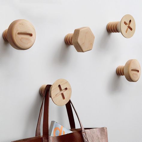 These Clever Wall Hooks Look Like Gigantic Screw Heads Home Decor Hooks, Black Walnut Wood, Wall Key Holder, Screws And Bolts, Wooden Hangers, Coat Hooks, Maple Wood, Wooden Walls, Storage Ideas