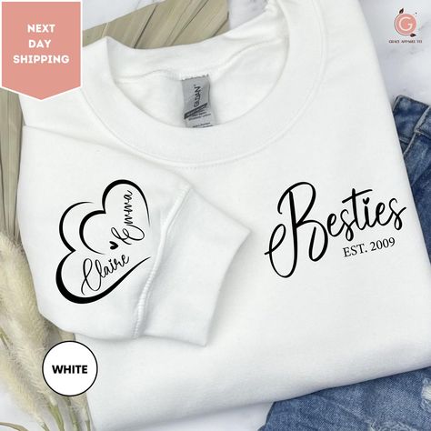 Personalized Besties Sweatshirt With Name on Sleeve, Best Friends Sweatshirt ,Cute Bestie Gift, Birthday Sweater For Best Friend, BFF Gifts ORDERING: 1. Review all photos 2. Choose Size and Color from drop-down menu 3. If personalization box is available, add your text color 4. Add each shirt to cart one at a time 5. Click "Add to Cart" - you can go back to add more products 6. Click "Proceed to Checkout" 7. Add note to seller for any requests * We use several different brand shirts, all of them are premium quality and soft shirts. The brands we send may vary depending on our stock situation. * We guarantee 100% satisfaction. The brands we use in- clude premium quality shirt brands such as Bella Canvas, Gildan Soft Style, Circle, Outlash. BULK DISCOUNTS AND SPECIAL REQUESTS: We offer bulk Birthday Sweater, Friends Sweatshirt, Friend Bff, Brand Shirts, Bestie Gifts, Sweatshirt Cute, Bff Gifts, One At A Time, Branded Shirts