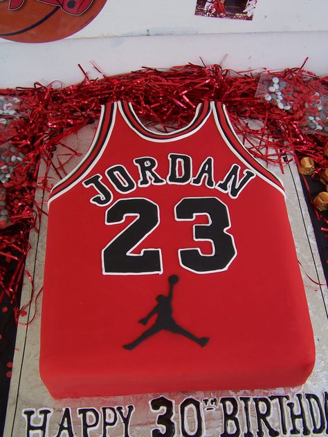 Fantastic Michael Jordan jersey cake for a 30th birthday celebration. Party décor by www.instinctsdesignstudio.com. Cake by www.cakesbycarlos.com Michael Jordan Cake, Michael Jordan Birthday, Jordan Cake, Basketball Birthday Cake, 30th Birthday Celebration, Ball Birthday Party, Jersey Cake, Jordan Baby Shower, 13 Birthday Cake