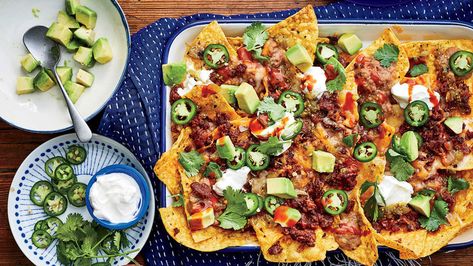 Sheet Pan Nachos with Chorizo and Refried Beans Recipe Sheet Pan Nachos, Pan Nachos, Refried Beans Recipe, Sheet Pan Suppers, Tex Mex Recipes, Sheet Pan Dinners, Smoked Sausage, Sheet Pan Recipes, Refried Beans