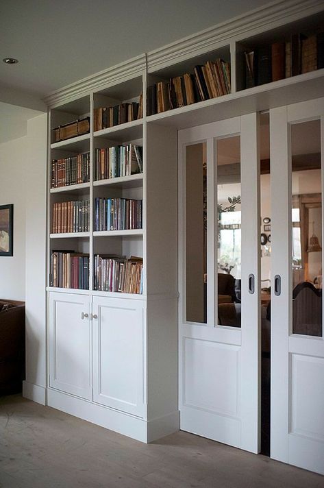 Built In Bookshelf Around Door, Storage Around Doorway, Built In Bookshelves Around French Doors, Built In Shelves Living Room Glass Doors, Bookshelf Around Doorway, Door In Bookshelf, White Library Room, Bookshelves Glass Doors, Lounge Bookshelves