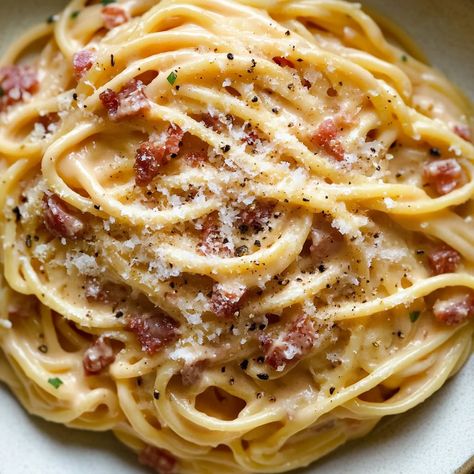 Discover this easy Spicy Carbonara recipe, combining creamy pasta with bold Calabrian chili for a delicious and fiery Italian dish.