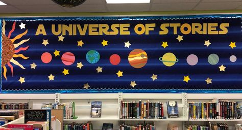 Outer Space Reading Corner, Universe Theme Classroom Decoration, Universe Classroom Theme, Space School Theme Ideas, Space Library Display, Space Theme Library, Out Of This World Classroom Theme, Outer Space Bulletin Board Ideas, Space Theme Book Fair