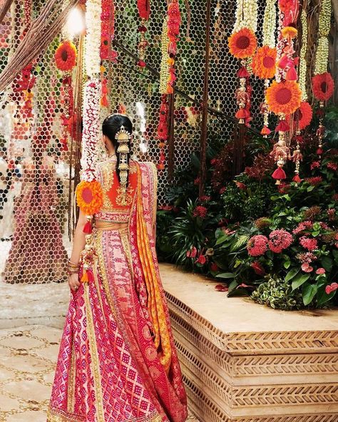 The bride-to-be Radhika Merchant is looking as always gorgeous in @manishmalhotravows designed Rani pink colour bandini lehenga for her mausalu ceremony💫💕

Also, the lehenga showcases real gold zari borders, embroidered with shlokas paying homage to the nine goddesses of Navratri. The vintage koti blouse features detailed metallic threadwork and Swarovski tassels. Each panel of the 35-meter bandhani lehenga bridges tradition and celebration with deep-rooted elegance. Radhika Merchant Wedding, Bandhani Lehenga, Radhika Merchant, Indian Bride Outfits, And So It Begins, Cruise Wedding, Manish Malhotra, Wedding Function, Bridal Lehenga