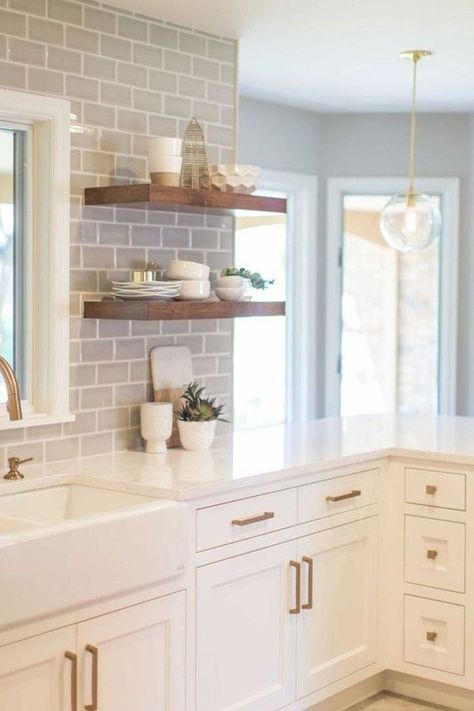 You'll want to remodel your own kitchen once you see these jaw-dropping kitchen makeover before-and-after pictures. #kitchenremodelvshomevalue Quartz Backsplash Kitchen, Closed Off Kitchen, Backsplash Decor, Herringbone Backsplash, Interior Vintage, Versace Home, White Kitchen Cabinets, Trendy Kitchen, Open Shelves