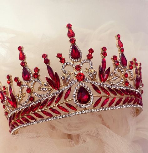 Beautiful ruby red Victorian crown with Swarovski crystals and gold metal. Perfect for a special occasion. This crown shines clear across a room would be perfect for a bride, pageant and all other events. Red Quinceanera Tiara, Crown For Quinceanera, Victorian Royalty, Sweet 16 Crowns, Crowns Royal, Quince Crowns, Burgundy Crown, Red Tiara, Victorian Crown