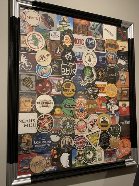 One idea to display those great memories of all the beers you’ve tasted!! Beer Coasters Diy Projects, Beer Sticker Display, Coasters Display Ideas, Travel Sticker Collection Display Ideas, Beer Coaster Display, Beer Stein Display Ideas, Brewery Stickers Display, Coaster Wall Decor, Beer Mat Display