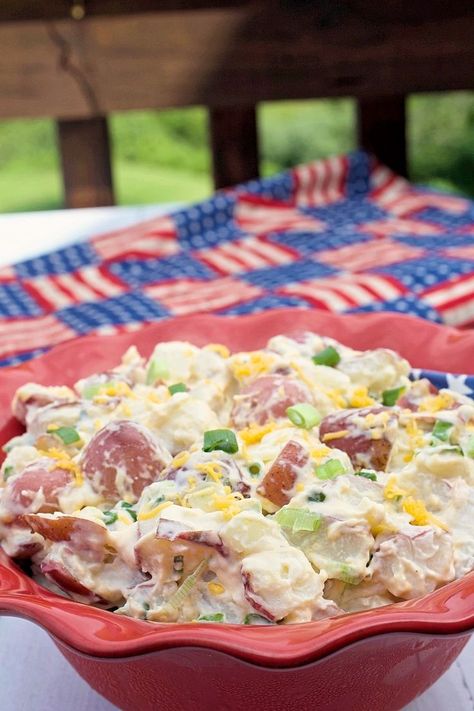 A red bowl of Steakhouse Potato Salad sitting on a picnic table. Country Potato Salad, Steak Potato Salad, My Country Table Recipes, Steakhouse Potato Salad, Steakhouse Potatoes, Recipe With Sour Cream, Brunch Salad, Steakhouse Recipes, Potato Salad Mustard