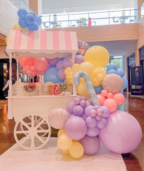 Indulge your sweet tooth in this candy cart adorned in a gorgeous pastel balloon garland! 🍭🎈✨ Satisfy your cravings with a burst of sweetness and color. 🙌🏼✨ Pastel Balloon Garland, Candy Balloons, Sweet Carts, Candy Cart, Mini Truck, Pastel Balloons, Balloon Backdrop, Balloon Decor, Mini Trucks