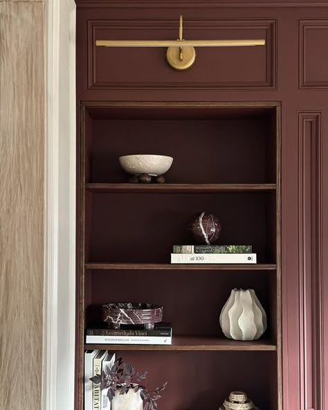 SARA LE on Instagram: "A little sneak peek because I just can’t resist. My living room built-ins are currently getting a refresh which is my first time introducing color! Nicolson Red by @benjaminmoore is the most sophisticated, romantic, moody red paint. We’re in the era of romanticizing our home and our life right now and I’m obsessssed. ♥️

#redinterior #redpaint #nicolsonred #moodyinteriors #housetohome #homeinterior #howihaven #homesohard #heyhomehey #sodomino #pursuepretty #stellarspaces #designsponge #doingneutralright #myhousethismonth #handmademodernhome #mydomaine #myhomevibe #makehomematter #interiordesign #interiorstyling #ighome" Red Built Ins, Maroon Bookshelf, Burgundy Built Ins, Maroon Ceiling, Walnut Built In Bookshelves, Dark Red Library, Burgundy Library, Brown Built Ins, Dining Room Turned Office