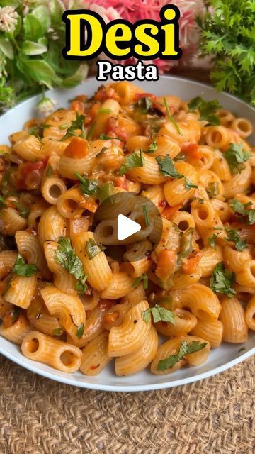 Abhishek Boke on Instagram: "Desi Pasta 😍❤️

Ingredients:
Oil
Garlic 
Onion 
Carrot 
Capsicum 
Tomato Chilli Sauce 
Mixed Herbs 
Boiled Macaroni
Cheese 
Coriander Leaves 

Desi pasta is a flavorful fusion dish that combines traditional Italian pasta with Indian spices and ingredients. It features bold flavors, often enhanced by masala sauces, fresh vegetables, and aromatic herbs, creating a unique and delicious twist on classic pasta.
.
.
.
.
.
.
.
#pasta #recipeoftheday #reels" Macaroni Recipes Indian, Indian Macaroni Recipe, Desi Pasta, Veg Pasta Recipes, Pasta Indian Style Recipe, Tomato Chilli Sauce, Traditional Italian Pasta, Mix Vegetable Recipe, Masala Sauce