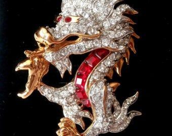 Crystal brooch swarovski | Etsy Dragon Brooch, Swan Logo, Dragon Jewelry, Jewelry Pins, Crystal Brooch, Themed Jewelry, Swarovski Jewelry, Red Crystals, Pin Brooch