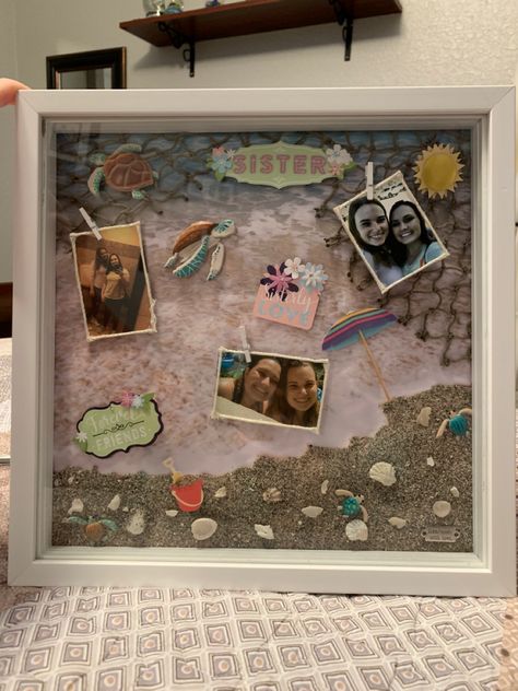 A shadow box created for a best friend/sister who loves the beach Cruise Shadow Box Ideas, Picture Shadow Box Ideas, Beach Shadow Box Ideas, Beach Memory Jars, Beach Shadow Boxes, Beachy Pictures, Shadow Box Memory, Shadow Box Ideas, Memory Jars