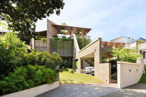 Anvar Residence / Silpi Architects | ArchDaily Silpi Architects, Residence Elevation, Green Corridor, Tropical Landscape Design, Terrace Floor, Kerala Home, Contemporary Houses, Small Modern Home, Sustainable Building