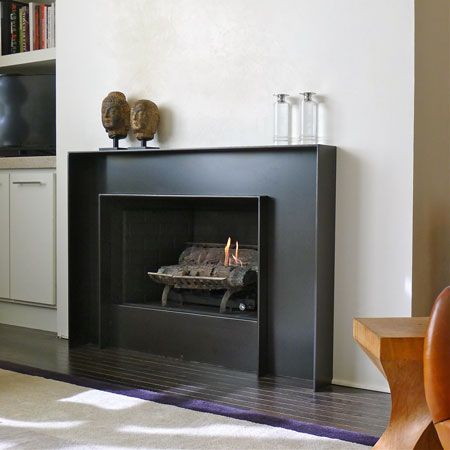 Assymetrically Balanced Hot Rolled Steel Fireplace Surround @ Tom & Pete's New Loft Rolled Steel Fireplace, Steel Fireplace Surround, Modern Fireplace Tiles, Steel Fireplace, Hot Rolled Steel, Metal Fireplace, Fireplace Tile Surround, Concrete Fireplace, Contemporary Fireplace