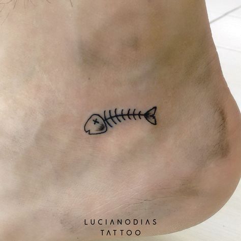 Mini fishbone tattoo made by me at the Black Box Studio. Tiny Bone Tattoo, Fish Stick And Poke Tattoo, Fish Skeleton Tattoo Simple, Fish Bone Tattoo Simple, Small Bone Tattoo, Simple Shin Tattoo, Bonefish Tattoo, Bone Fish Tattoo, Fish Finger Tattoo