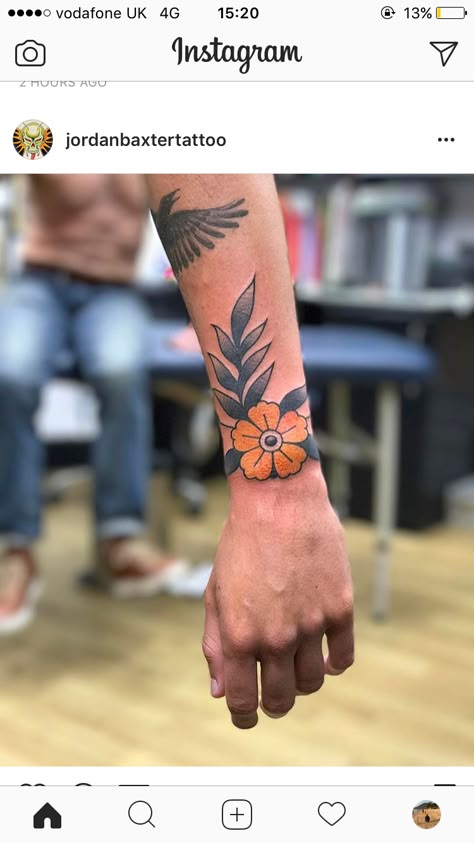 Traditional flower wrist tattoo Traditional Flower Tattoo Men, Wrist American Traditional Tattoo, American Traditional Wrist Band Tattoo, Trad Wrist Tattoo, Traditional Wrist Tattoos For Women, Old School Wrist Tattoo, Wrist Tattoo Traditional, Wrist Tattoos Traditional, Traditional Wrist Cuff Tattoo