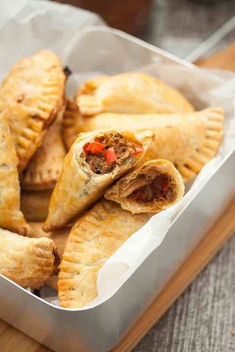 These baked Spicy Pulled Pork Empanadas are delicious pulled pork and some Latin flavour, all encased in a rich, flaky pastry. Pulled Pork Empanadas, Baked Pulled Pork, Pork Empanadas, Spicy Pulled Pork, Roasted Tomato Salsa, Chimichurri Recipe, Empanada Recipe, Mexican Street Food, Empanadas Recipe