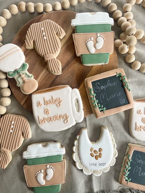 Gender Reveal Coffee Theme, Coffee Themed Party Favors, Coffee Baby Shower Cookies, Bean Baby Shower Ideas, Coffee Shop Baby Shower Ideas, A Baby Is Brewing Cookies, Baby Shower Coffee Theme, Coffee Baby Shower Theme, Baby Is Brewing Shower Ideas Coffee