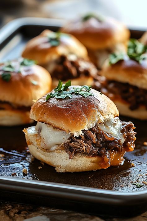 French Dip Sliders French Dip Sliders Slow Cooker, Easy Football Sunday Dinner, Korean Beef Sliders, Pot Roast French Dip, Short Rib Sliders Slow Cooker, French Dip Bites, Pot Roast Sliders Hawaiian Rolls, Steak Sliders With Horseradish, Crescent Roll Sliders