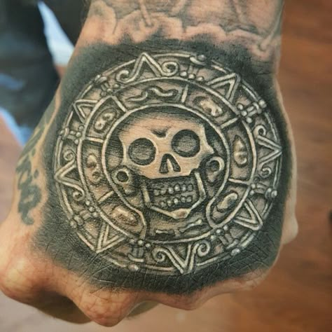 Hand tattoo. Pirate coin. Aztec Gold Tattoo, Pirates Medallion Tattoo, Pirate Medallion Tattoo, Pirate Hand Tattoo, Pirate Tattoo Ideas, Pirate Themed Tattoos, Pirate Tattoo Sleeve, Coin Tattoo, Pirate Tattoos