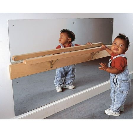 Little ones will be entertained while developing motor skills. The See Me Stand Mirror and Bar by Environments will excite infants as they learn to pull up and balance with the help of the maple rail. (WATCH THEM GROW: Promotes visual tracking, concentration, movements and motor development; BALANCE: Infants will eventually learn to balance from practicing pulling up and standing while holding onto the bar; ACRYLIC MIRROR: Inquisitive little ones can watch themselves in the wall-mounted shatterp Daycare Rooms Setup, Home Daycare Rooms, Money Thoughts, Infant Room Daycare, Daycare Setup, Childcare Rooms, Daycare Rooms, Stand Mirror, Preschool Decor