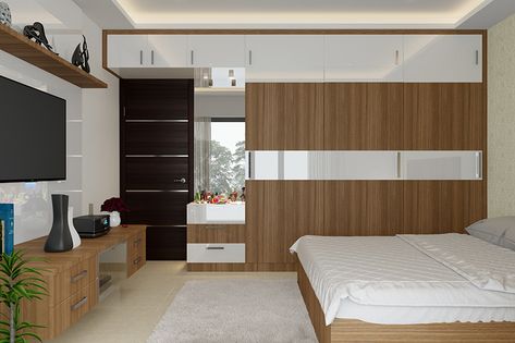 Modern wardrobe designs for a master bedroom with the same matching wooden colour for tv unit and bed Wardrobe Laminate Design, Wall Wardrobe Design, Bedroom Wardrobe Design, Modern Cupboard Design, Wardrobe Door Designs, Wardrobe Designs, Bedroom Cupboard Designs, Wardrobe Interior Design, Modern Bedroom Interior