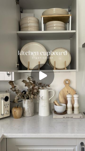 KATIE PEAKE HOME INTERIORS on Instagram: "Organise my kitchen cupboards with me 🫶🏻🍽️☕️  . Plates are from @tescofood, cupboard shelves are @amazonhome & wooden plate stands are @ikeauk  . Kitchen organisation, inside my cupboards, storage ideas, organisation ideas, kitchen cupboards  . . #kitchencupboard #kitchencupboards #cupboardorganisation #cupboard #cupboards #mugorganizer #mugorganiser #kitchenorganization #kitchenorganisation #kitchenorganizationideas #insidemycupboards #cuporganization #dinnerplate #dinnerplates #modernfarmhousestyle #modernfarmhousedecor #modernfarmhousekitchen #neutralhome #coffeecups #cupboardlove #pantrycupboard #homeorganisation #homeorganizationtips #homeorganizing #homeorganising #homeorganizationhacks #organisationhacks #kitchenhacks #kitchenhack" Plate Storage Kitchen Shelves, Kitchen Cupboard Organization Layout, How To Organise Kitchen Cupboards, Organisation Ideas Kitchen, Organizing Kitchen Cupboards, Katie Peake, Cupboard Organization, Kitchen Cupboard Organization, Organisation Ideas