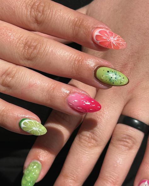 Cute little fruits 🍉🥝🍇🍊🍋‍🟩 #nailart #nailtech #nailsalon #thenailbargf #nailartspecialist #nailinspo #greatfallsnailtechs #greatfallssalon #funkynails #weirdnails #3dnailart #auranails #handpaintednailart #nailzbydevshop #charmnails #3dnailart #gelxnails #auranails #funkynails Pickle Nail Art, Painted Nail Art, Crazy Nails, 3d Nail Art, Funky Nails, Nail Tech, Nail Salon, Nail Inspo, Nail Art