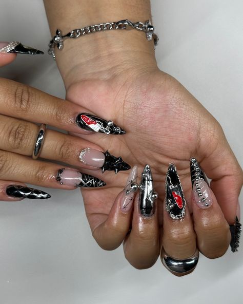 It’s a knife 🔪 🩸 our version of Halloween nails ! . . . #gelx #nailtech #fypシ #viral #halloween #nailart #nails #gothnails #nycnailtech #explorepage #nailsofinstagram Halloween gothic goth nails 2024 black knife chain metal chrome gel Goth Nails, Nail Tech, Halloween Nails, Nail Art, Chain, Nails