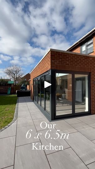 19K views · 680 reactions | Come inside our 6x6.5m kitchen 🤗 

When we viewed the property it was two separate rooms and we knocked them through and added a 3m extension. 

We use this space all the time! We do have a separate lounge but if I’m honest, it’s a kids playroom 😂 … they’ve taken it over! 

#bifoldingdoors #cornerbifolddoors #kitchenextensions #openplankitchendiner #shakerkitchen #singlestoreyextension #skylantern 

Would you have this much glass? | Emily Smythe | Dua Lipa · Illusion Home Extension Ideas Room Additions, Glass Extension Kitchen, Corner Bifold Doors, Glass Room Extension, Single Storey Extension, Garden Room Extensions, Open Plan Kitchen Diner, Room Extensions, Glass Extension