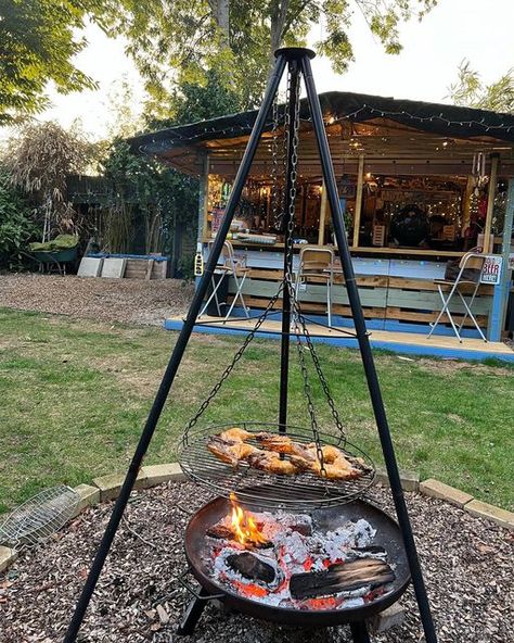 Meating of Minds on Instagram: "Great weekend cooking up a meat feast medley at my Uncle & Aunt’s place. He has a hell of a shack which he fashioned out of old pallets. 2 barbecues on the go, one being the fire-pit/tripod combo and the second being a car wheel. My first time using a wheel…worked so well I took one home! 🤣 Chicken Legs, Salmon, Burgers, Sausages and Corn on the barbecues. Finished the night around the fire with some decent Whiskey. #meatingofminds" Home Chicken, Weekend Cooking, One Home, My Uncle, Old Pallets, Chicken Legs, Sausages, Salmon Burgers, The Fire