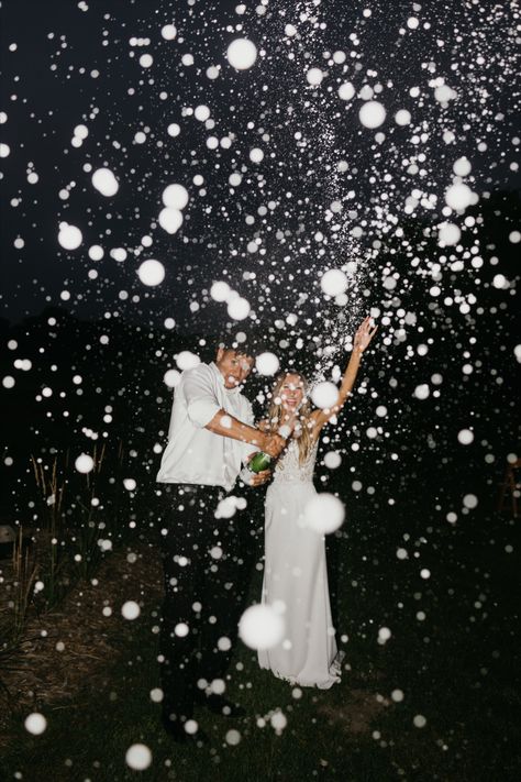 couple popping champagne at their wedding, nighttime photos Nightime Wedding, Champagne Spray, Waterfall Engagement, Night Time Wedding, Big Sur Wedding, Earthy Wedding, Wedding Engagement Pictures, Flash Photo, Engagement Pictures Poses