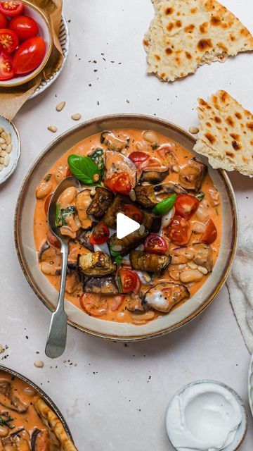 Amy Lanza | Vegan Food & Recipes ✨ on Instagram: "Roasted Aubergine Creamy Tomato Beans 🍅🍆
Ready in 30 minutes, these high-protein creamy saucy beans are packed with tomatoes and aubergines and tomato pesto, perfect for a midweek meal - who wants some?
.
Welcome to another episode of 30-minute vegan meals and these DELICIOUSLY tomatoey, pesto and creamy beans, packed balsamic roasted aubergine, and a great source of protein and fibre and ready with minimal effort and maximum flavour ✨
.
These beans are perfect with breads, rice or other wholegrains and are naturally plant-based, gluten-free, dairy-free and they’re ideal for a family-friendly or meal prep recipe to try. They are my new FAVOURITE 🥰
.
🍅comment below “beans” and I’ll DM you🍅
.
Roasted Aubergine Creamy Tomato Beans 🍅🍆
He Saucy Beans, Creamy Beans, Roasted Aubergine, Vegan Plan, Dinner Vegetarian, Coconut Yoghurt, Tomato Puree, Dried Basil, Plant Based Cookbook