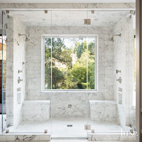 Designer Mead Quin and Gruber kept things in the house visually quiet so as not to detract from the views. The master bath, where marble tile from Integrated Resources Group (IRG) frames a leafy treetop scene, is a good example. The dual shower heads and controls are by Waterworks. Modern Home Remodel, Bright Chair, San Francisco Home, Board Formed Concrete, Restoration Hardware Style, San Francisco Houses, Concrete Fireplace, Bathroom Images, Have A Shower